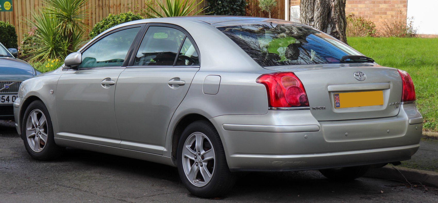Silver hatchback rear and side view with alloy wheels and distinctive taillights