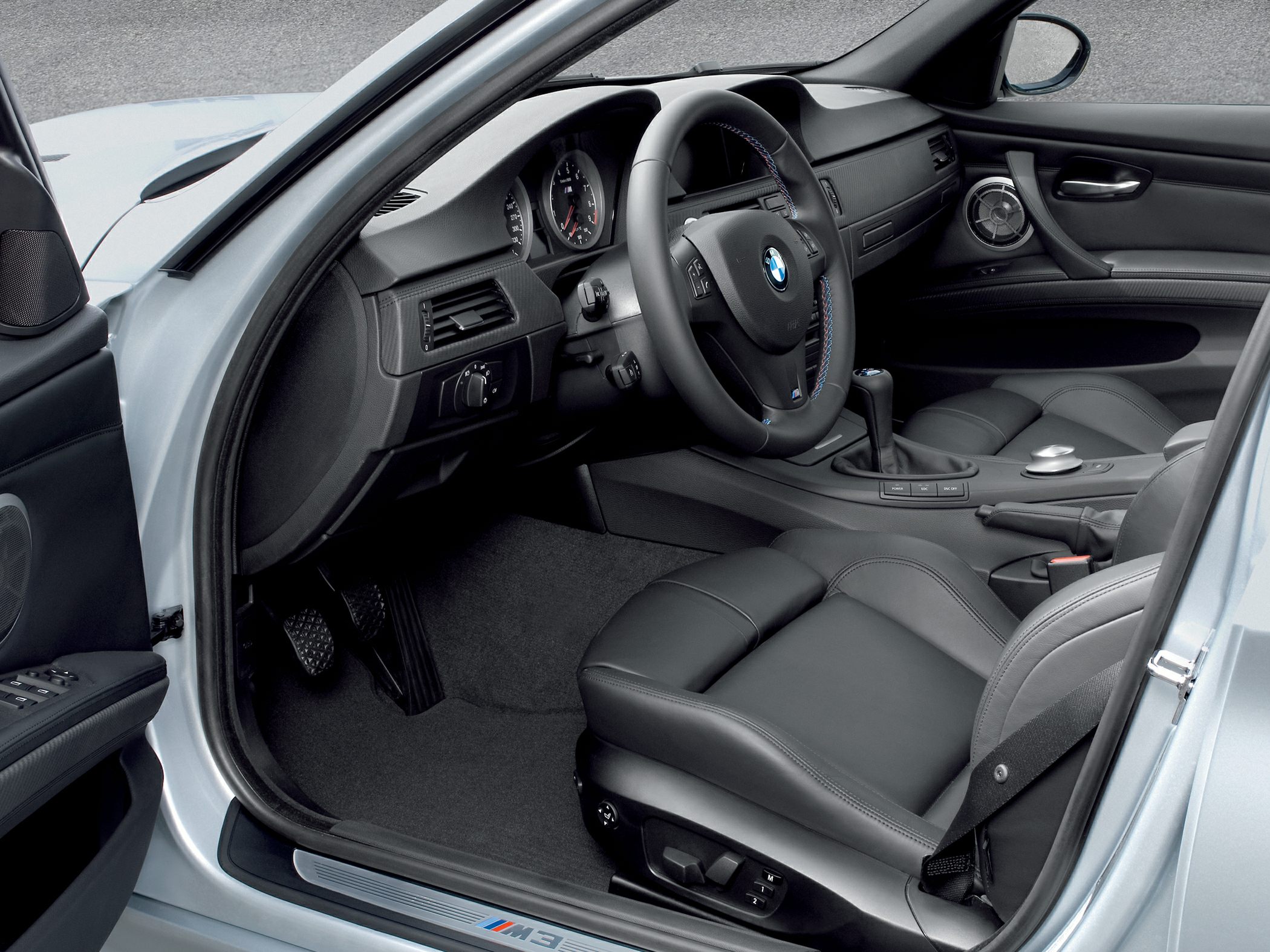Sporty leather seats and manual gearbox in modern car interior