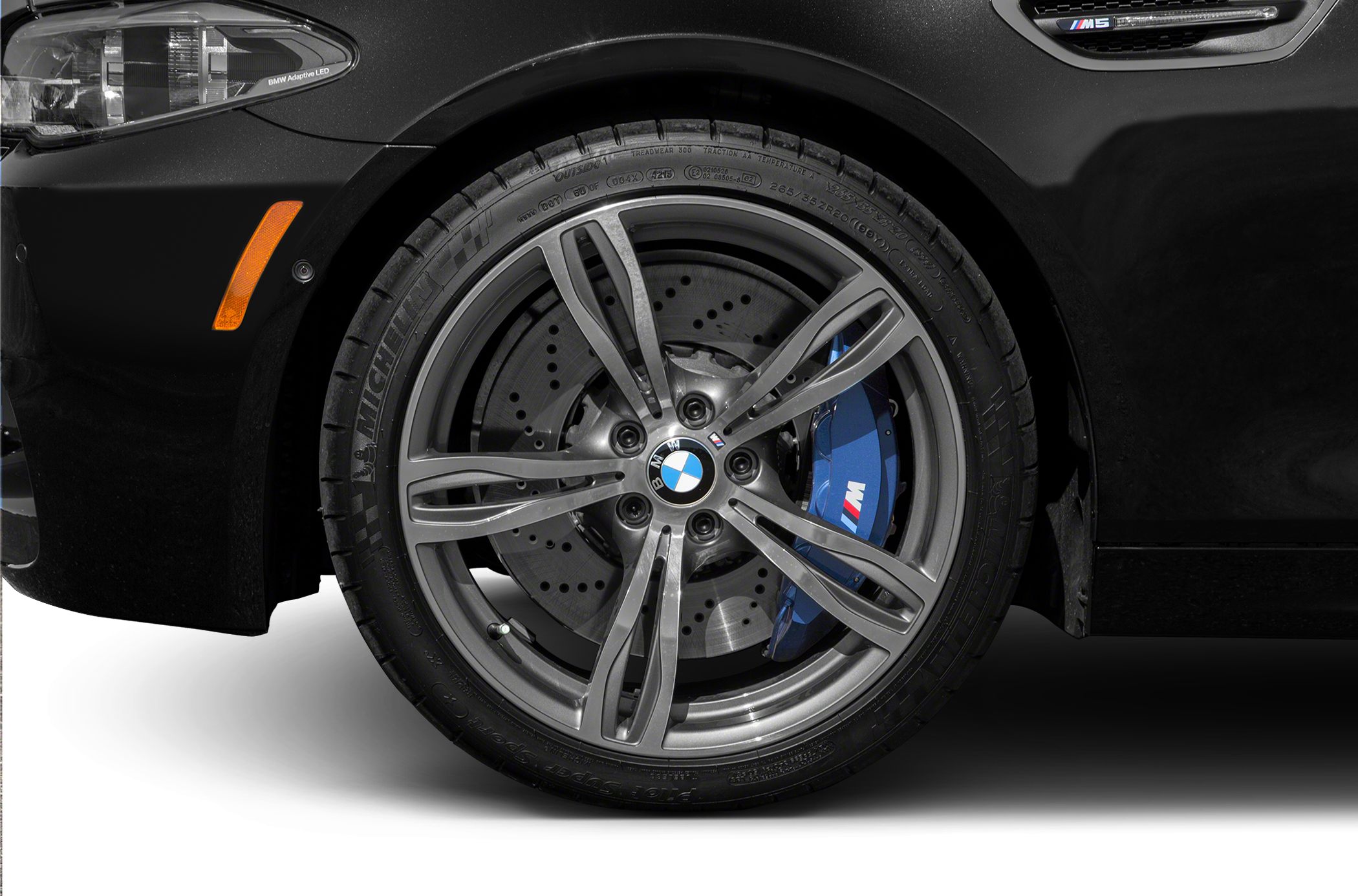 Alloy wheel with blue high-performance M brake caliper and ventilated disc brake