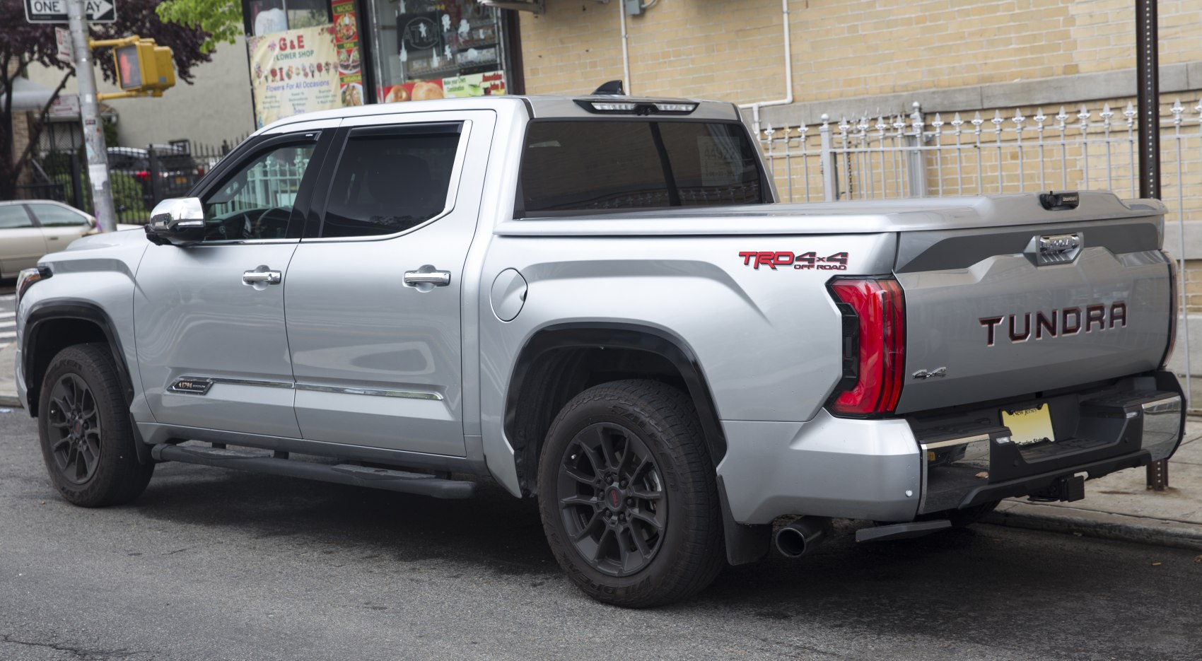 Silver pickup with TRD 4x4 badge and short bed