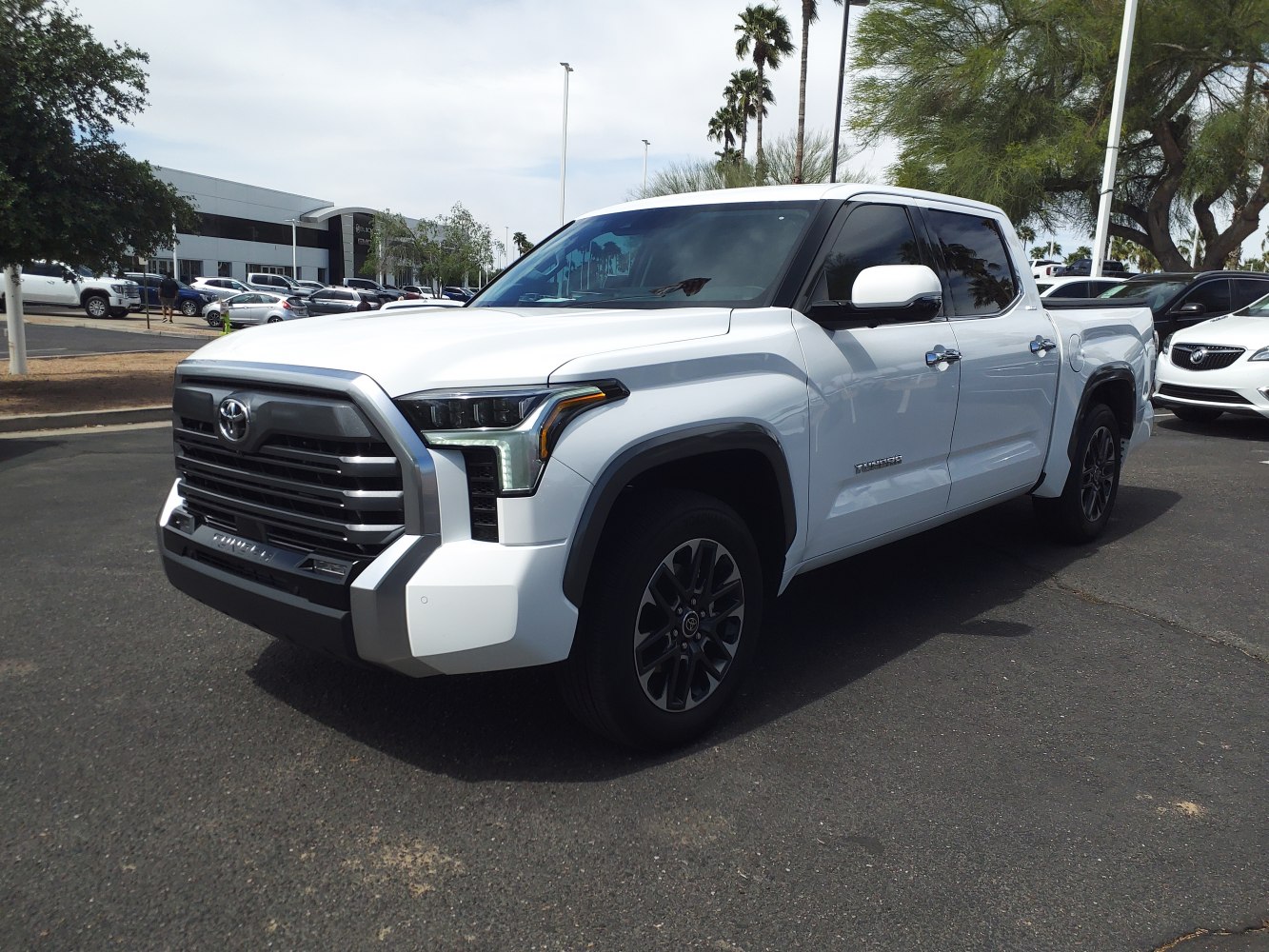 Front aggressive grille and CrewMax short bed side profile