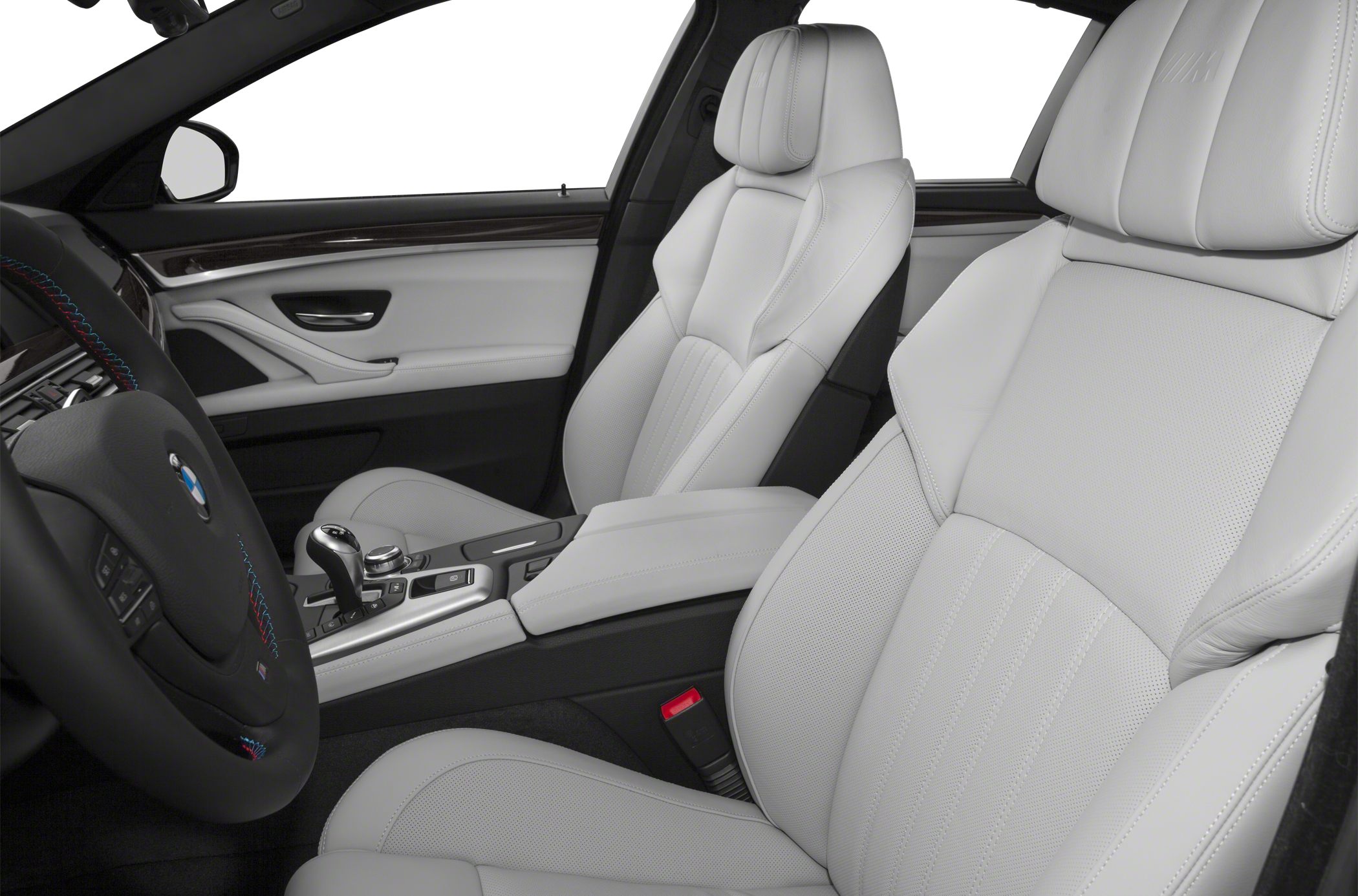 White leather seats and detailed steering wheel with M stripes