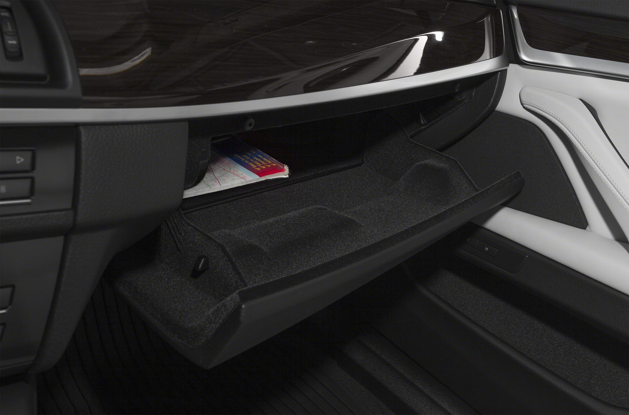 Open glove compartment with premium interior trim and storage