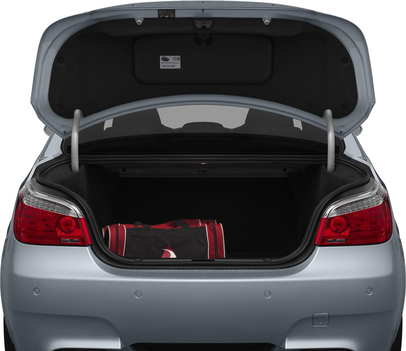 Open rear trunk with visible storage space and a duffle bag inside