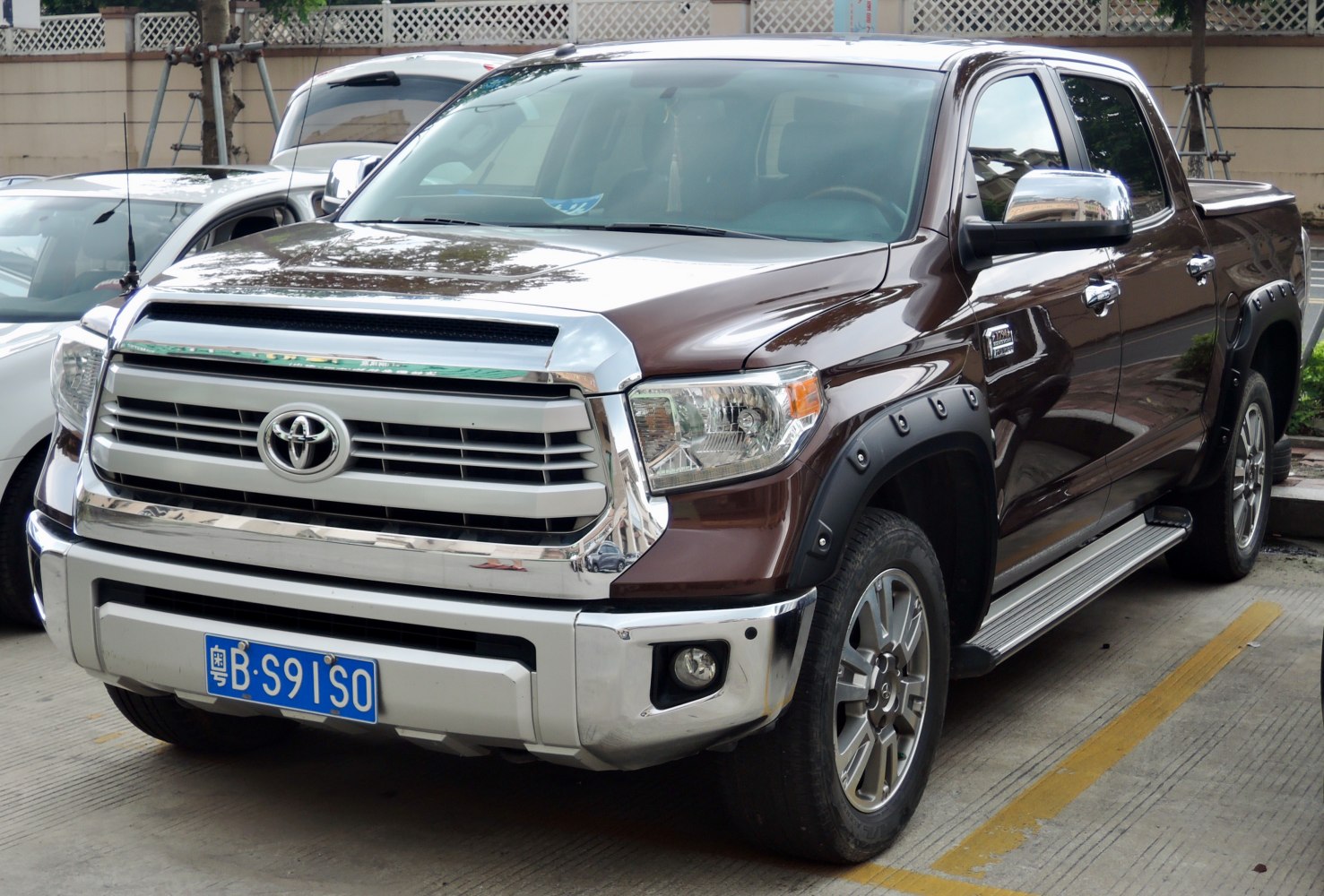 Pick-up truck front grill and fender flare with chrome details
