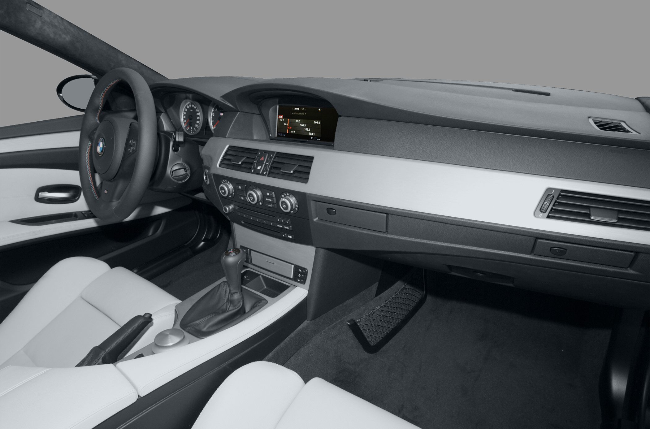 Modern BMW dashboard with multifunction steering and gear shift