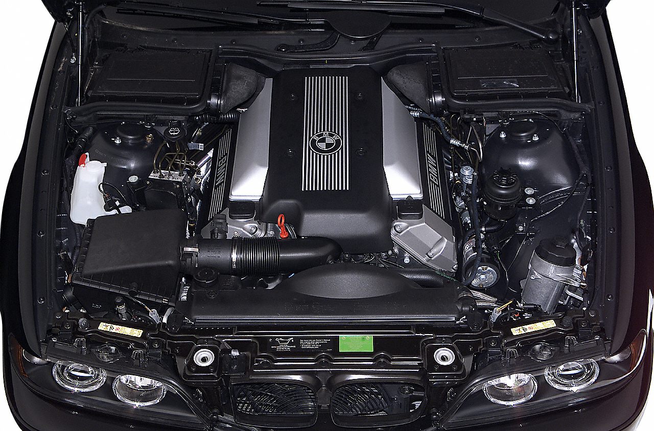 Engine bay with prominently displayed BMW inline engine cover and components