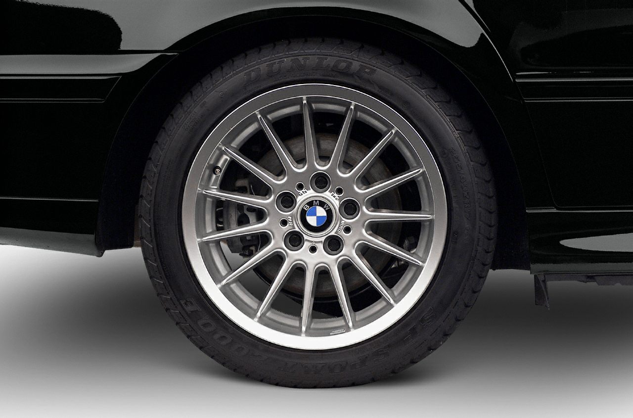 Silver multi-spoke alloy wheel with Dunlop tire