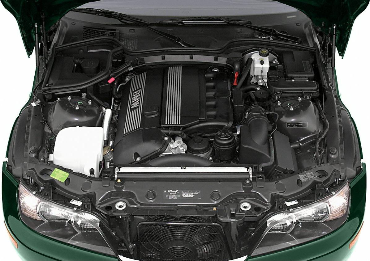 Engine bay with BMW motor components and layout.