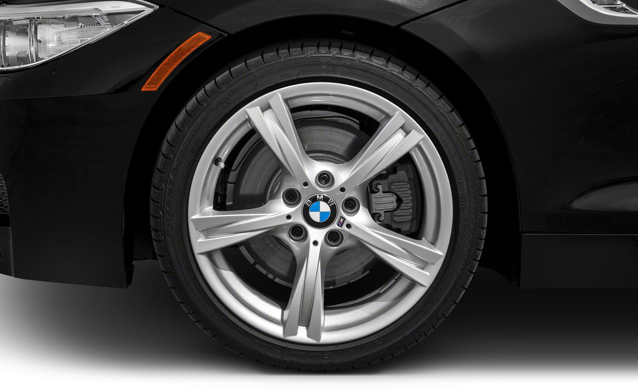 Close-up of BMW alloy wheel and fender marker