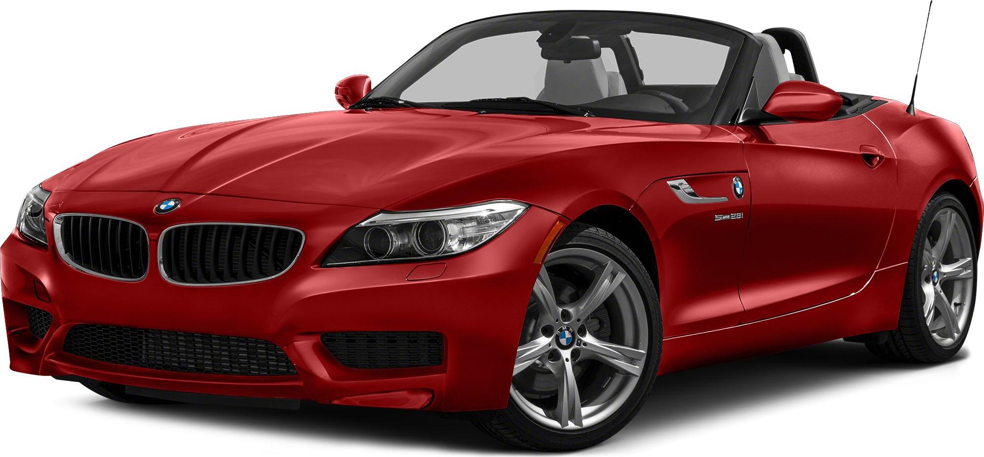 Red convertible sports car front view with sleek design and alloy wheels