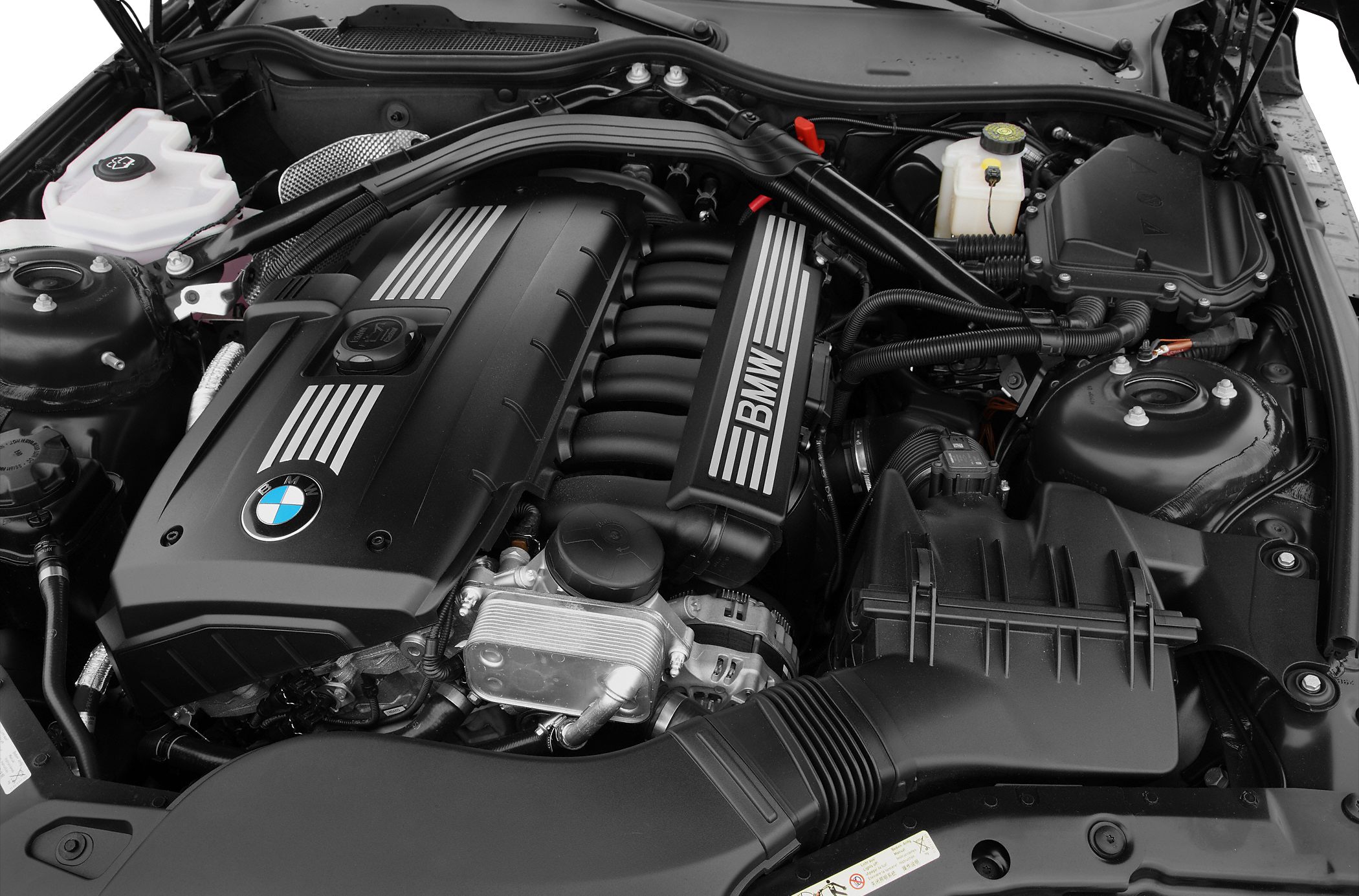 BMW engine bay with detailed engine components and intake system