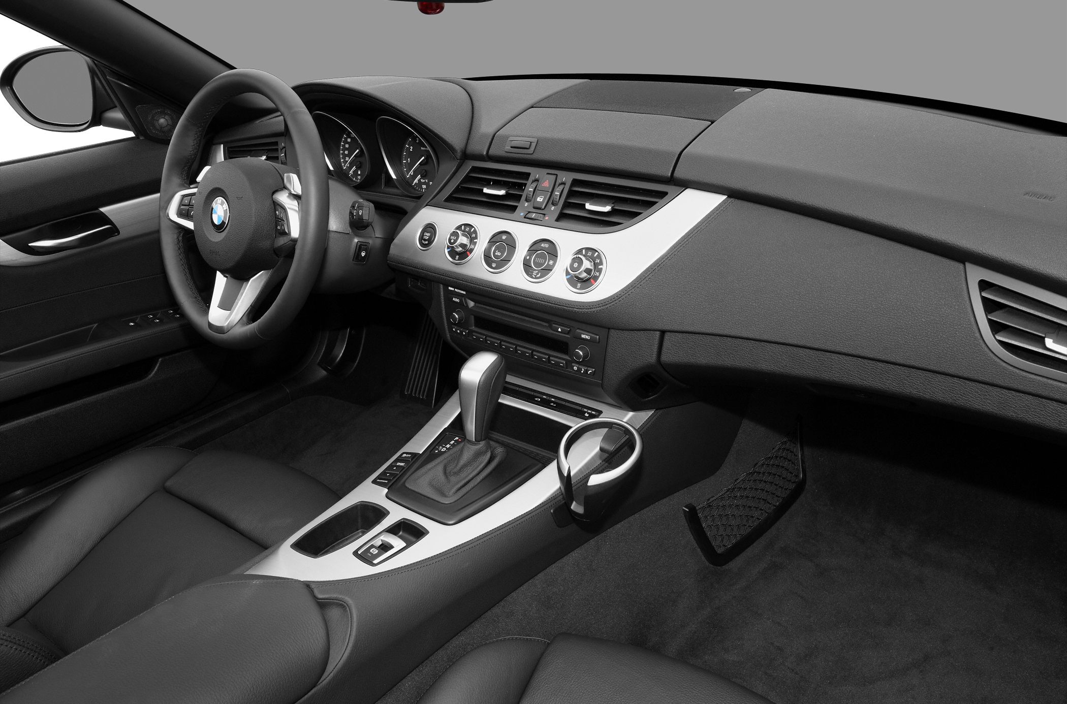 Dashboard and steering wheel with center console and gear lever