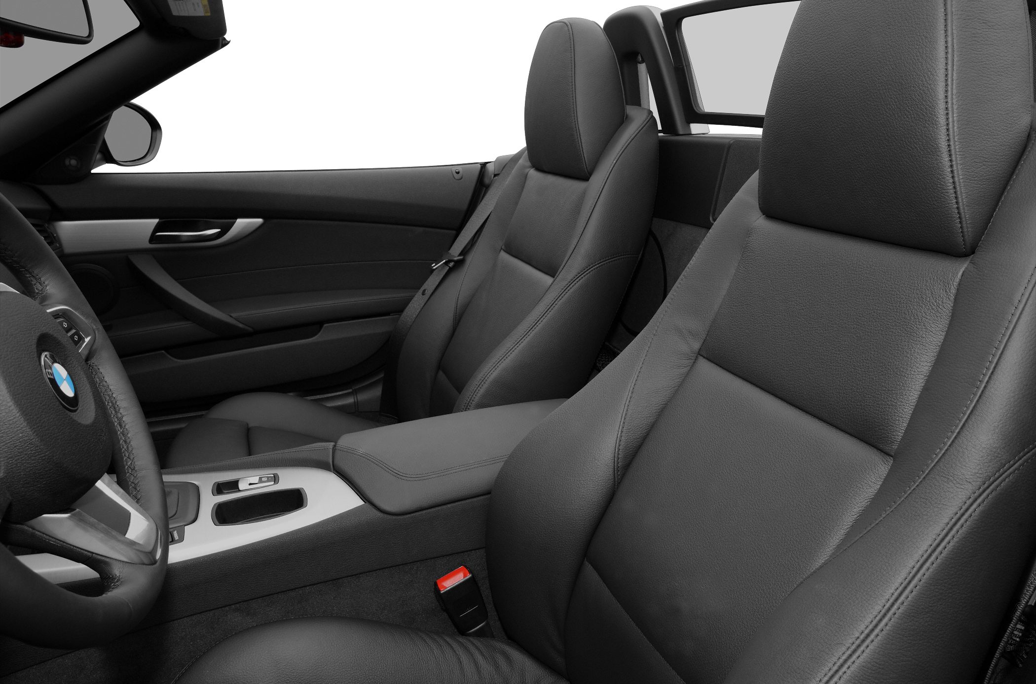 Black leather seats and center console in car interior