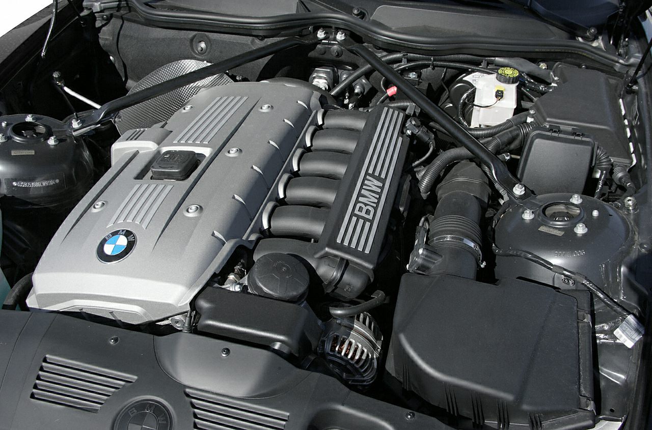 Engine bay with BMW labeled engine cover and intake manifold