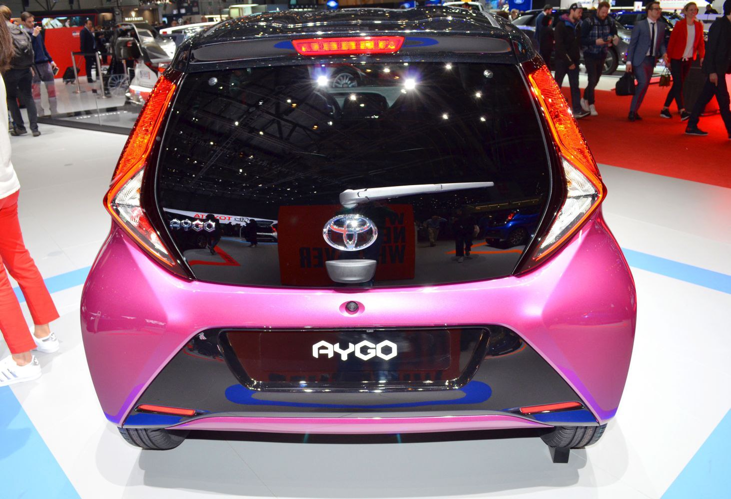Rear view of compact hatchback with distinctive taillights and rear wiper