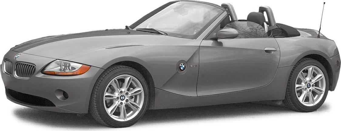 Front-side view of a convertible sports roadster with alloy wheels and side mirrors