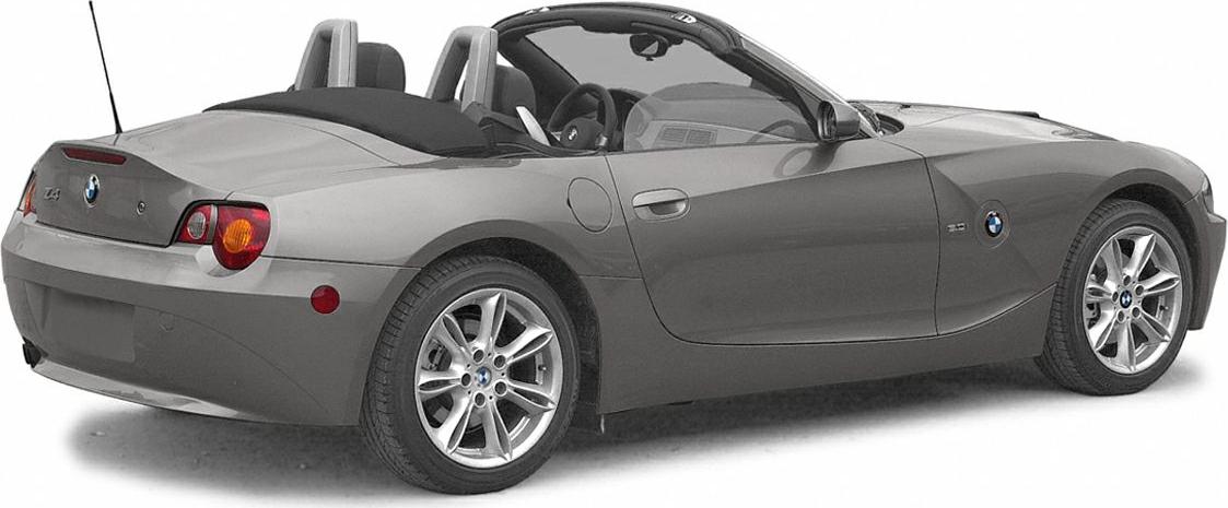 Rear side view of a convertible roadster with alloy wheels and open roof