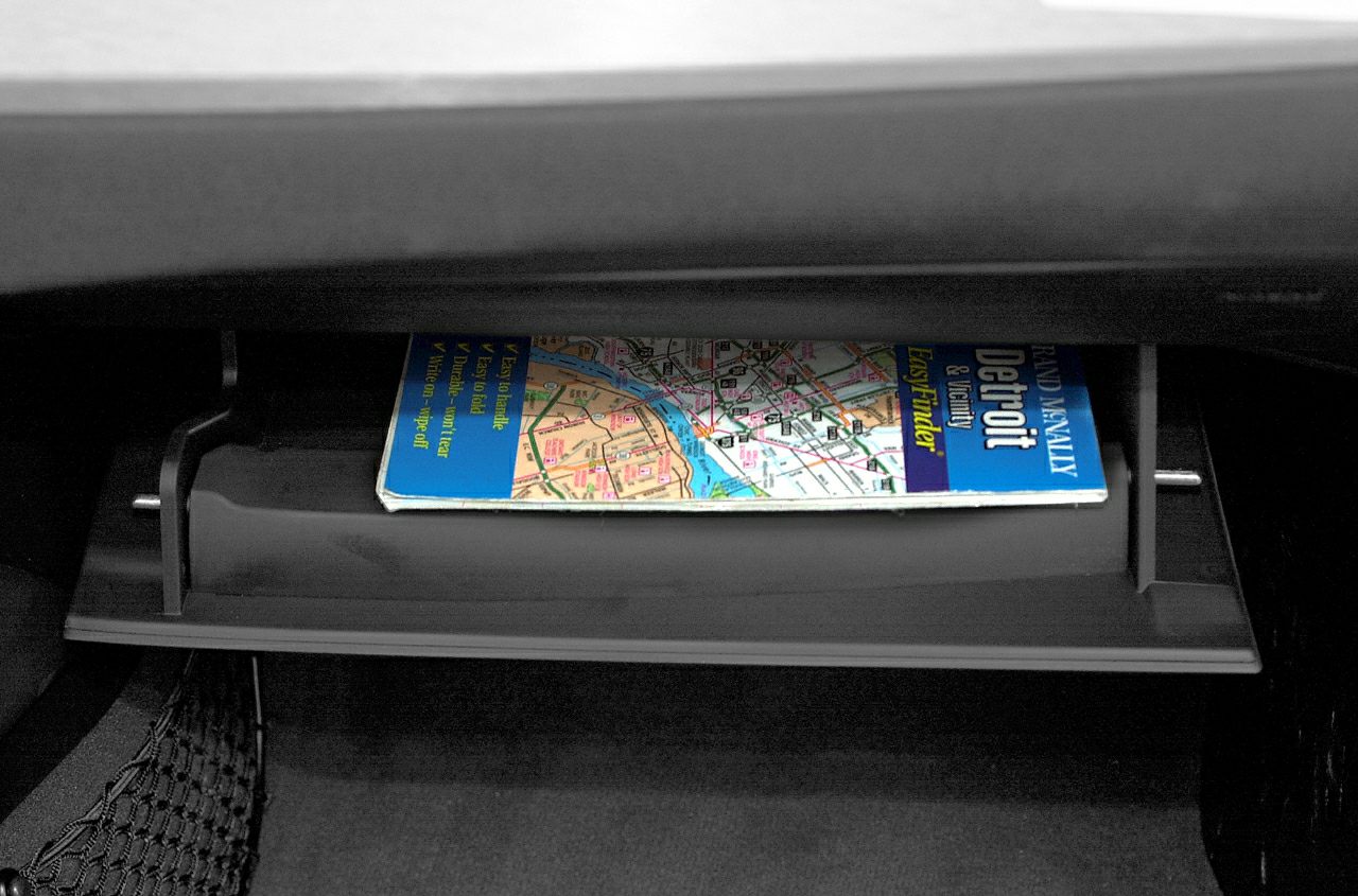 Glove compartment with road map inside