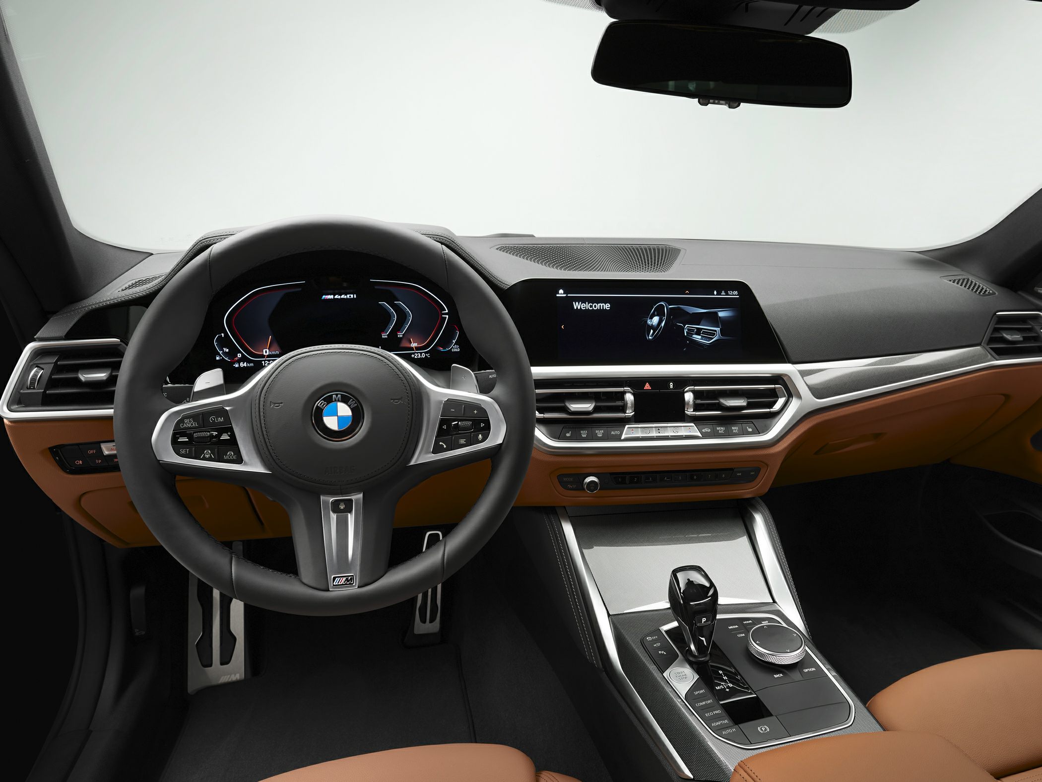 Steering wheel and digital dashboard with center console.