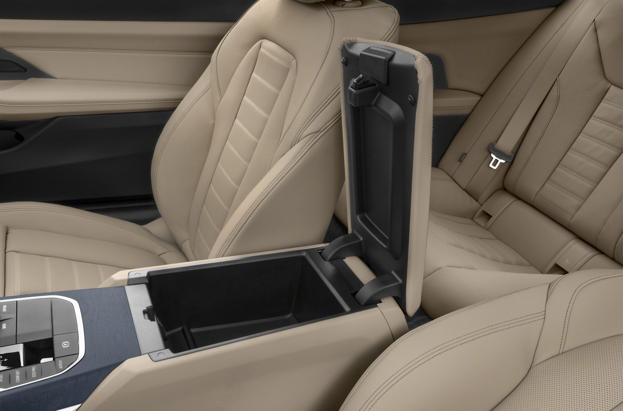 Beige leather seats with open center console compartment