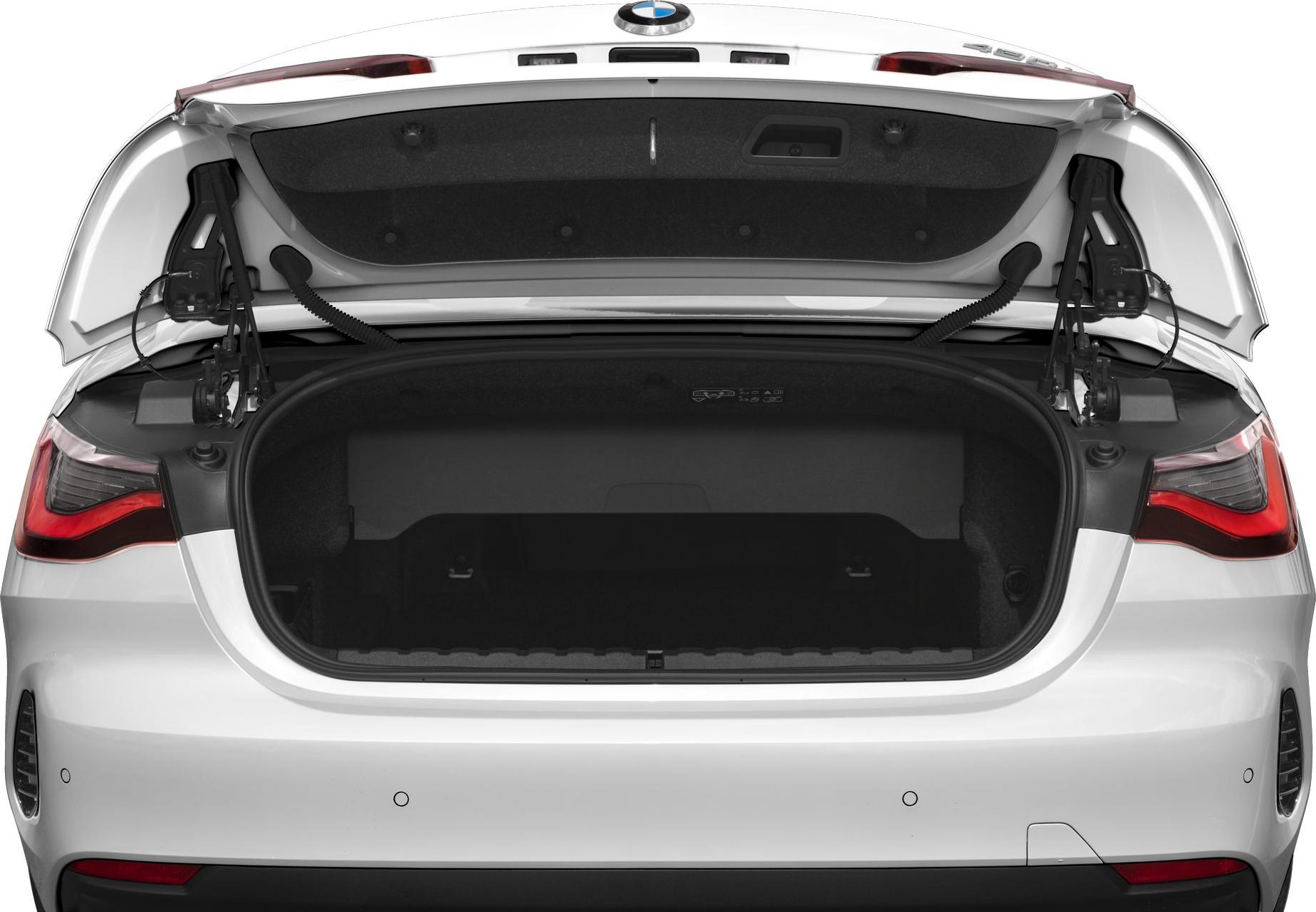 Open trunk with spacious cargo area and rear lights.