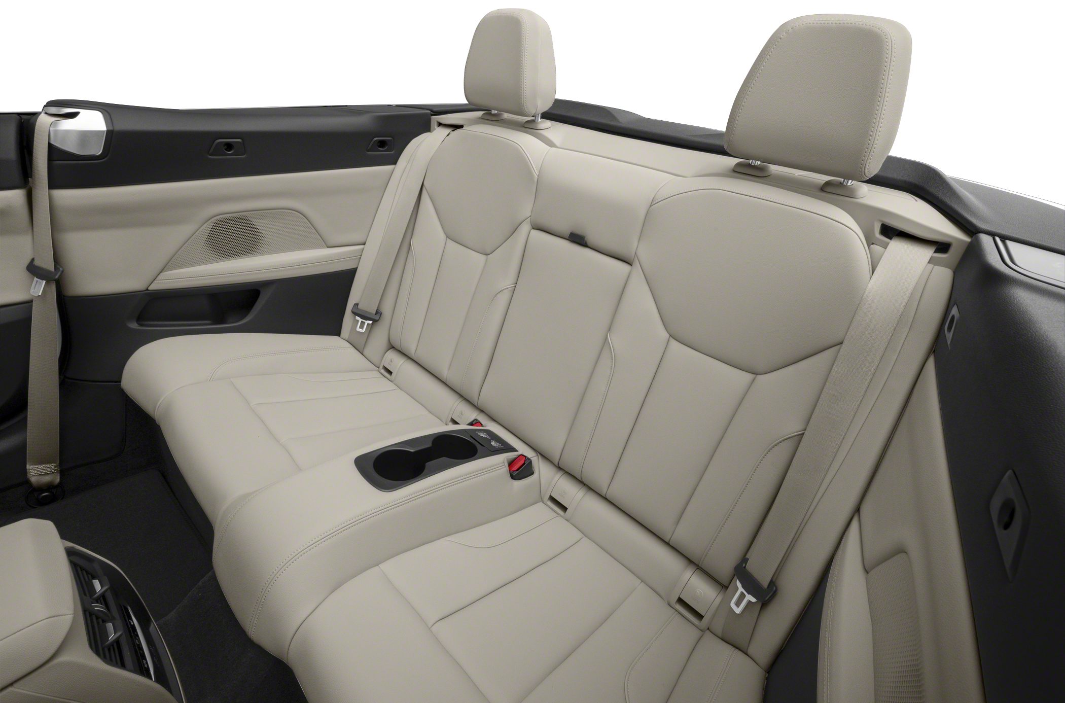 Beige leather rear seats with cup holders in convertible car