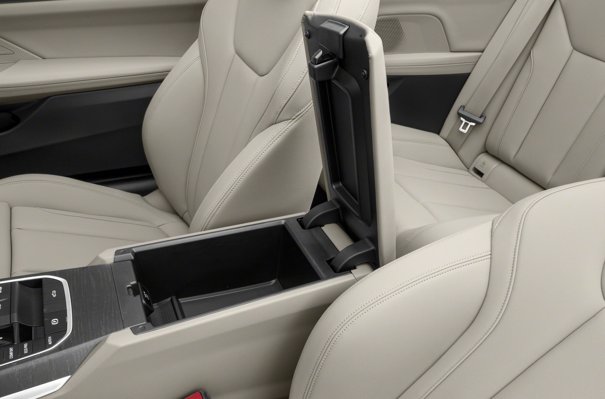 Beige leather seats and open center console storage compartment