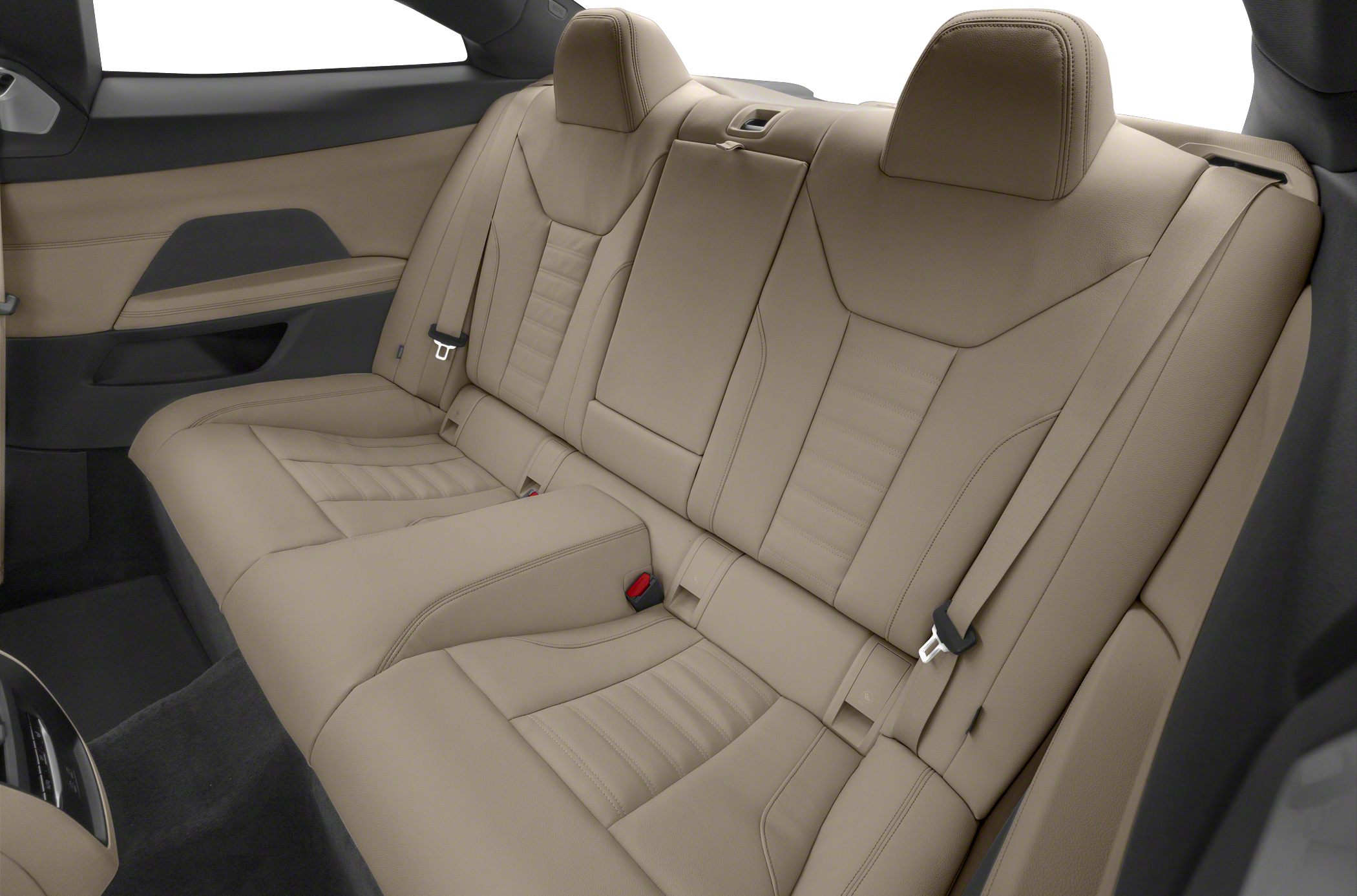 Beige leather rear seats with integrated headrests and seat belts