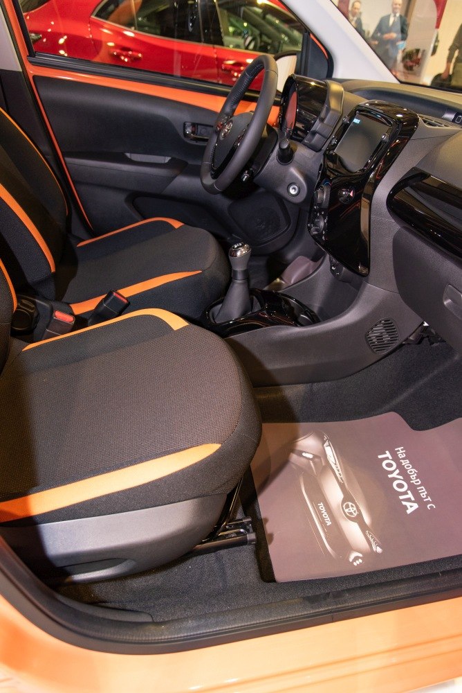 Compact interior with manual gearshift and modern dashboard
