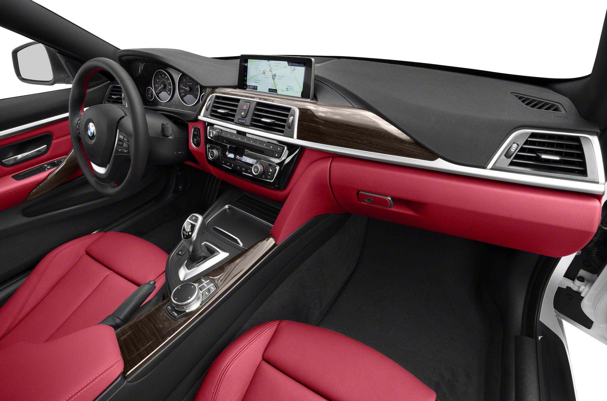Red leather seats with wood trim dashboard and infotainment display
