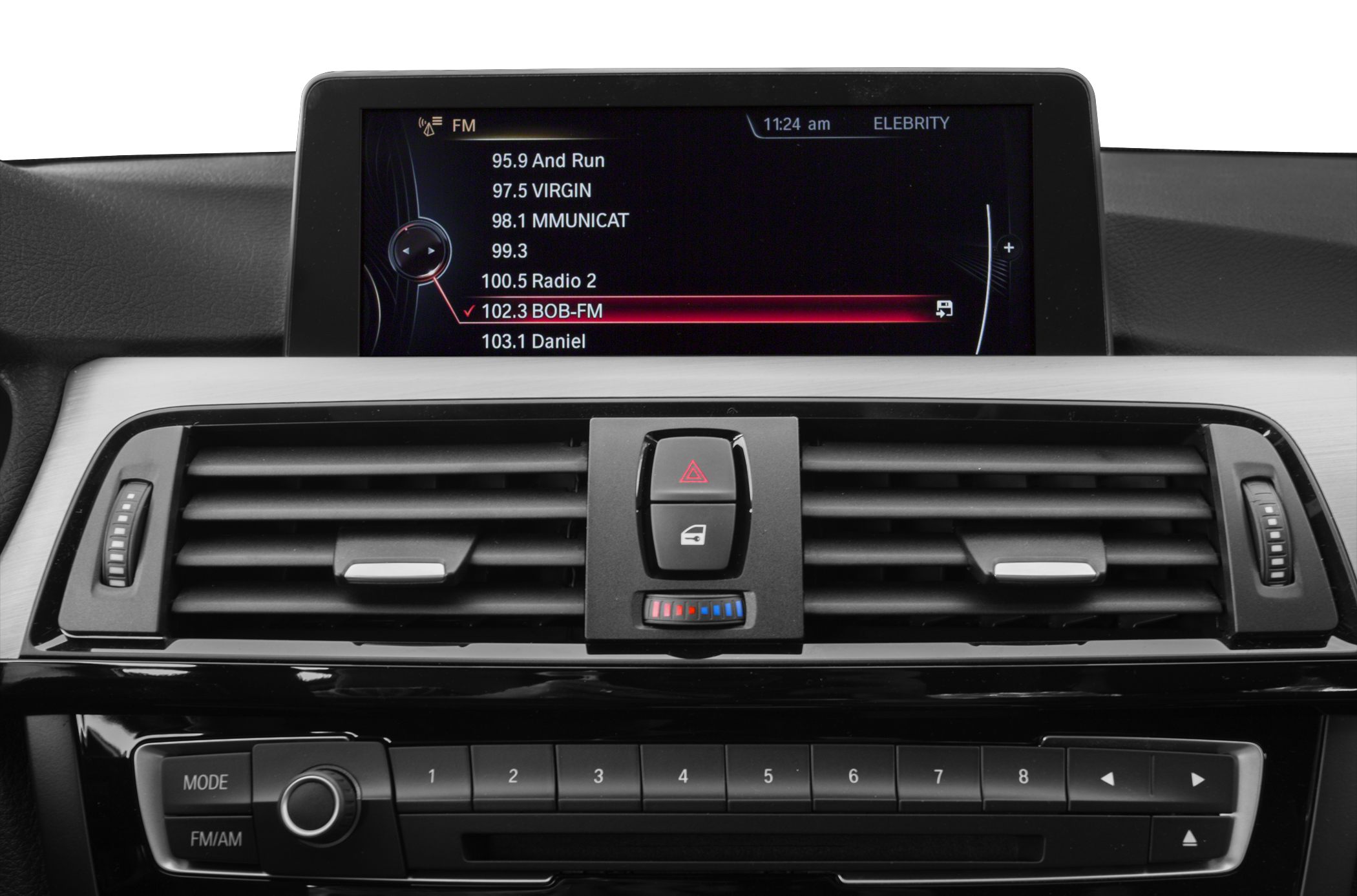 Car interior with digital infotainment display and centralized climate controls