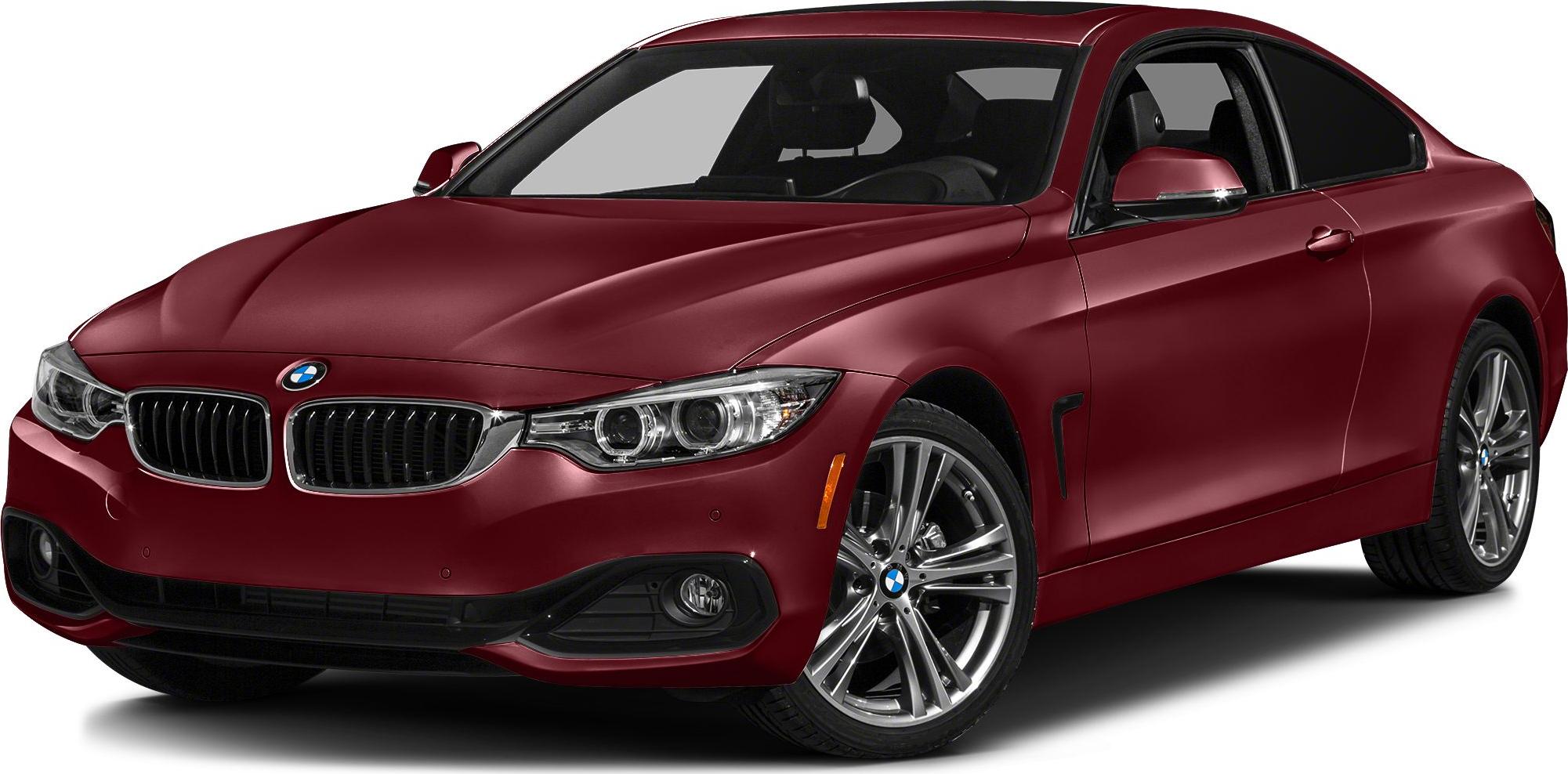 Front view of a red 4-door coupe with LED headlights and alloy wheels