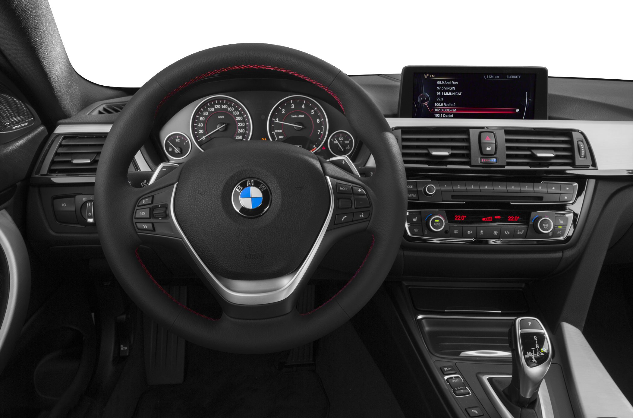 Steering wheel, dashboard, infotainment system, and gear selector