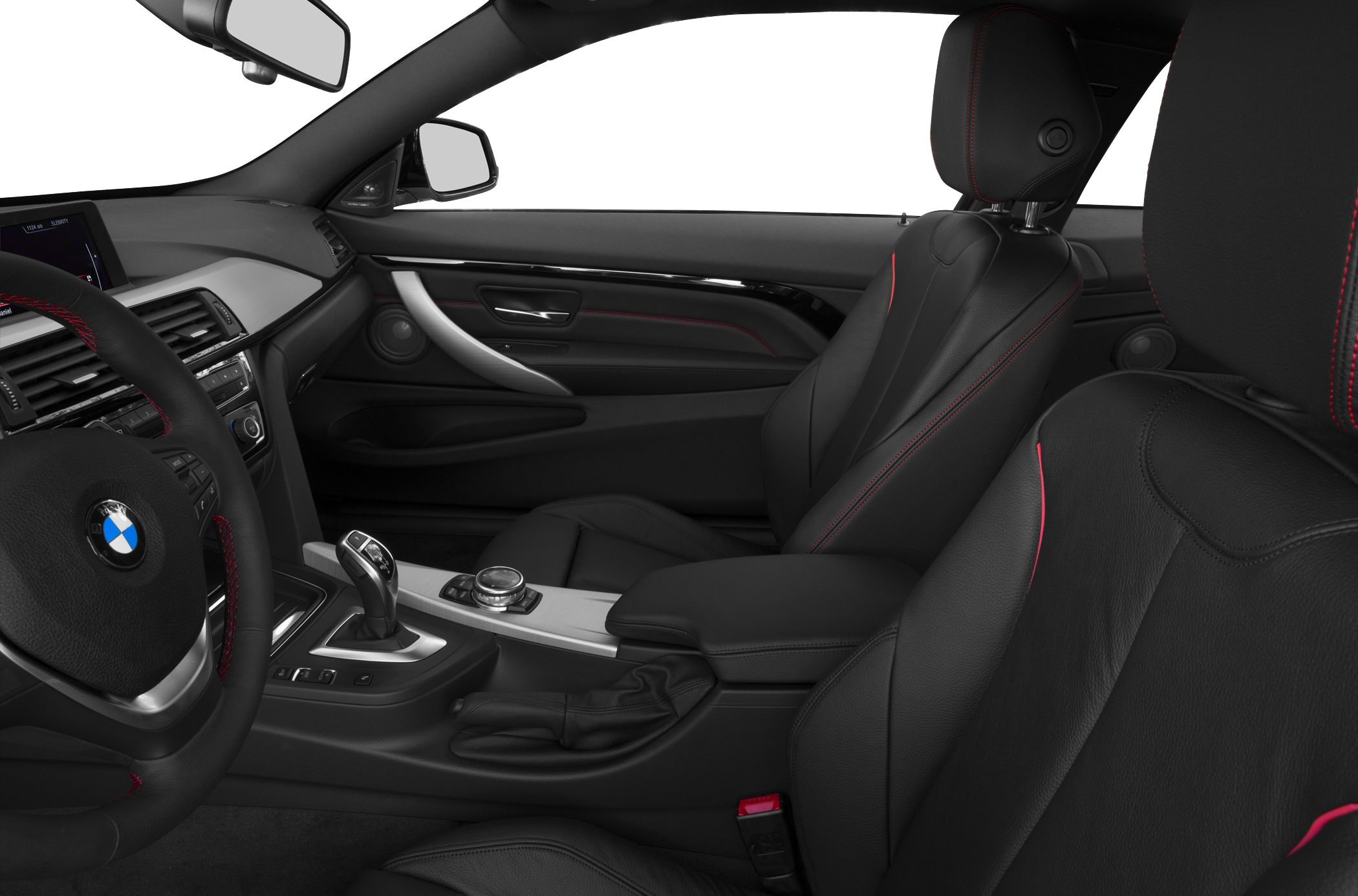 Black leather interior seats with red stitching and a modern center console