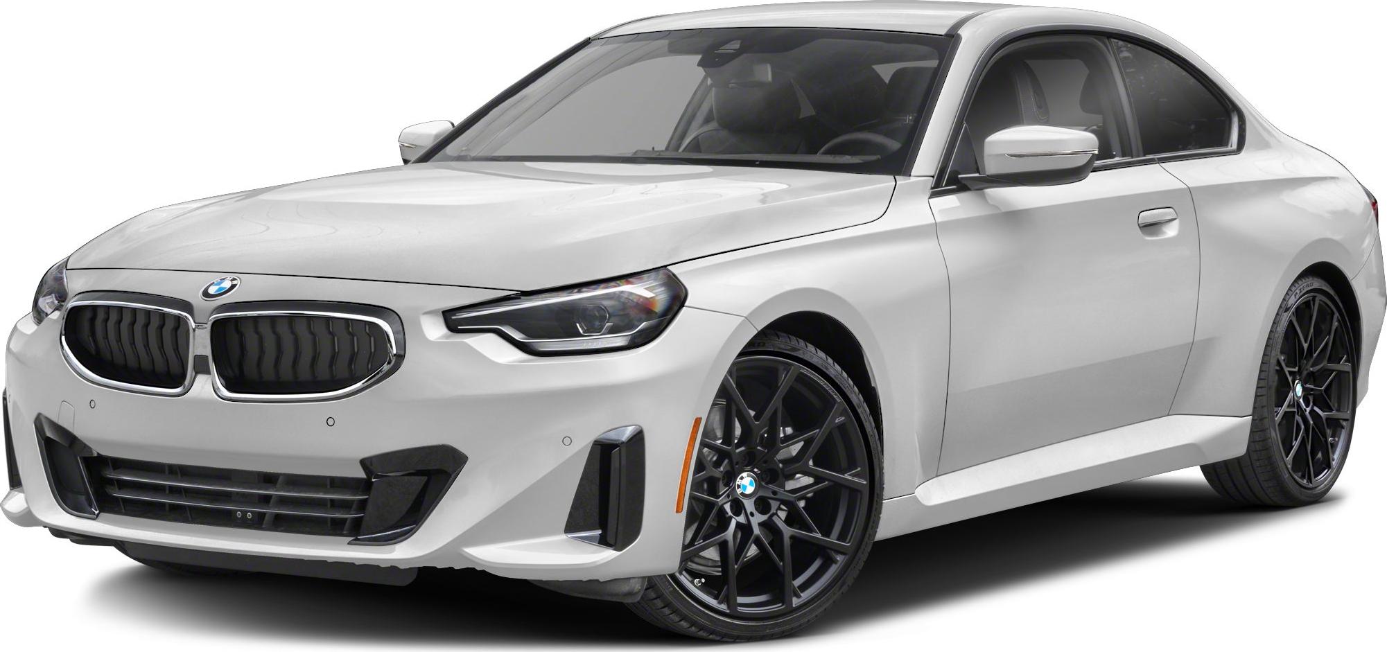 White luxury coupe with black alloy wheels and LED headlights