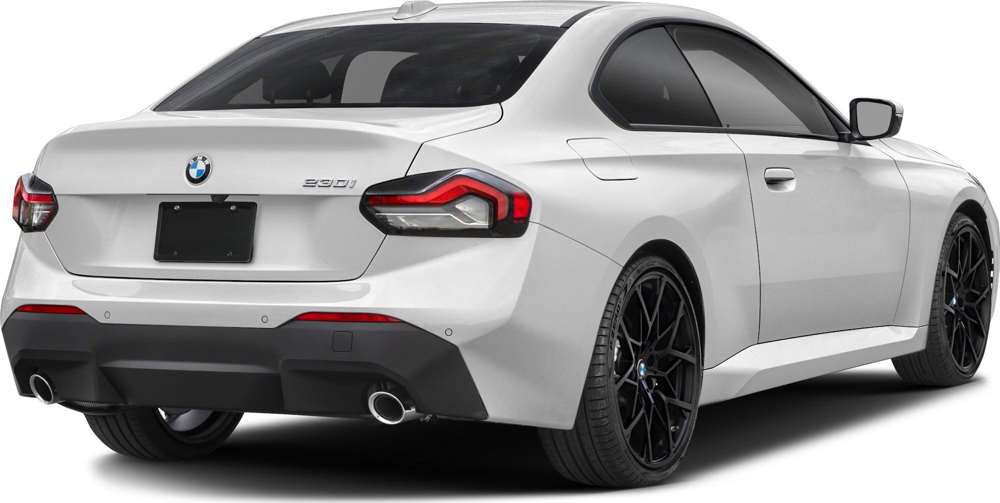 Rear view, distinctive tail lights, dual exhaust, black wheels