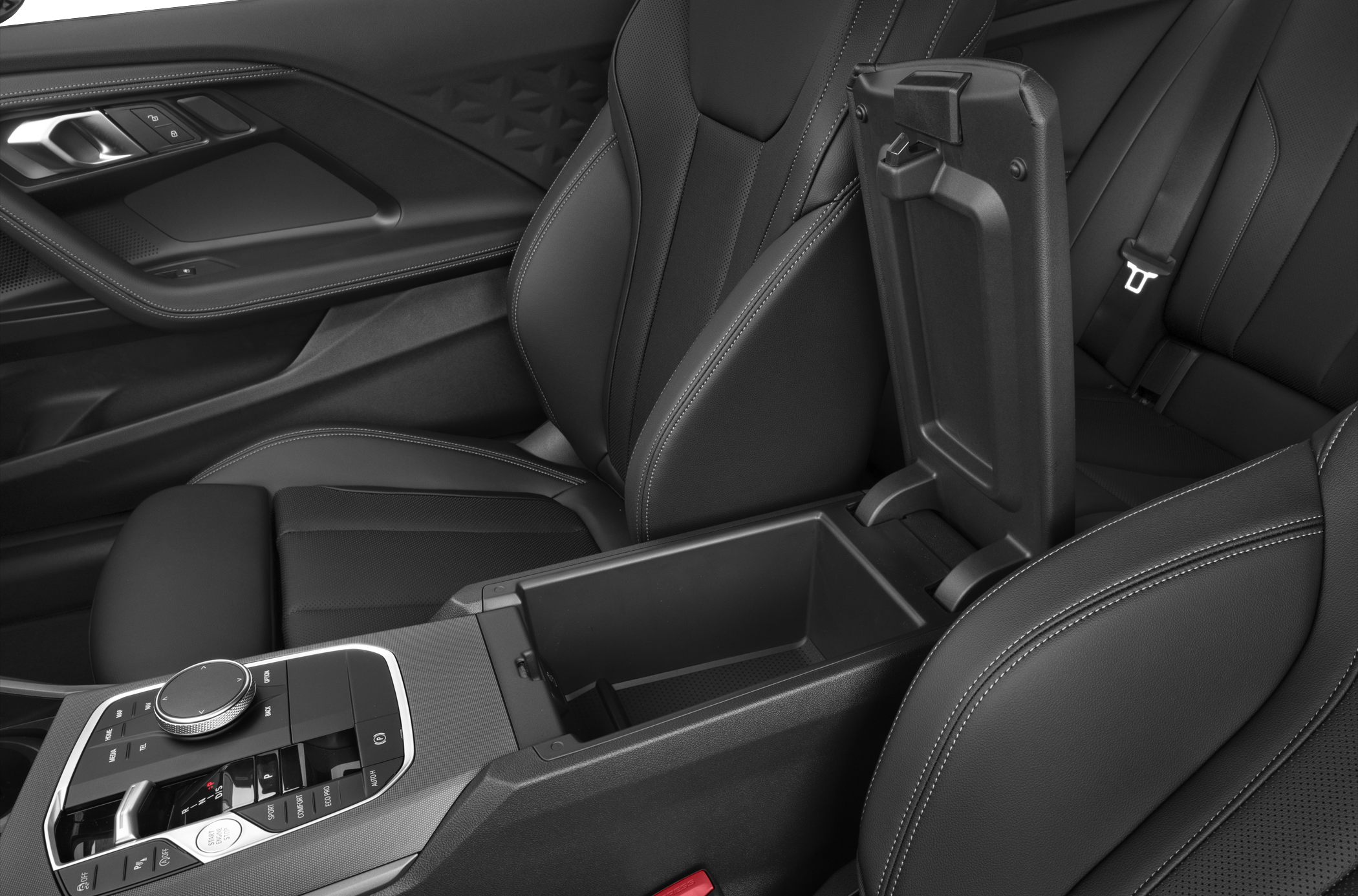 Interior center console storage and front seats with precision stitching