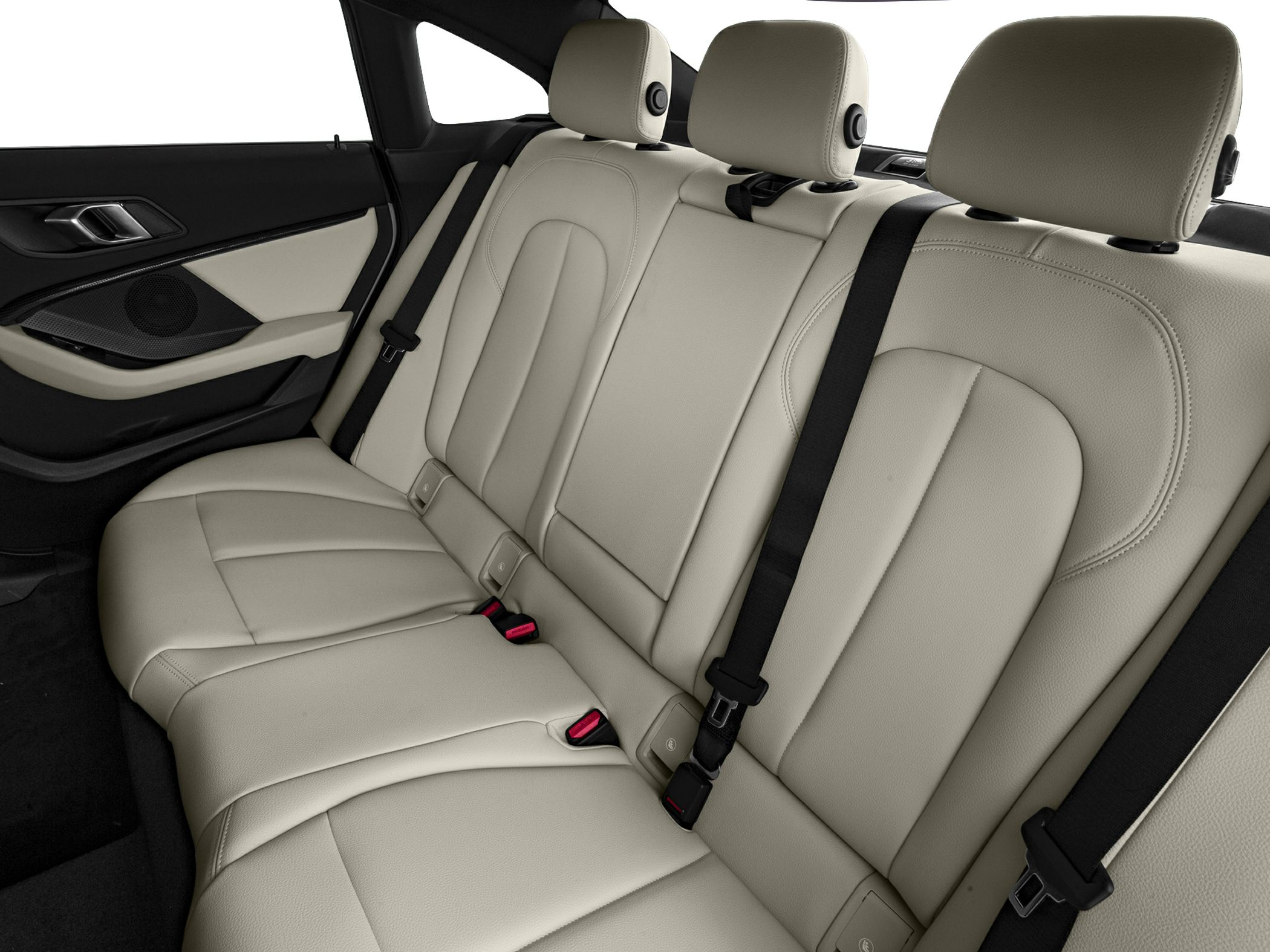Beige leather rear seats with headrests and seat belts