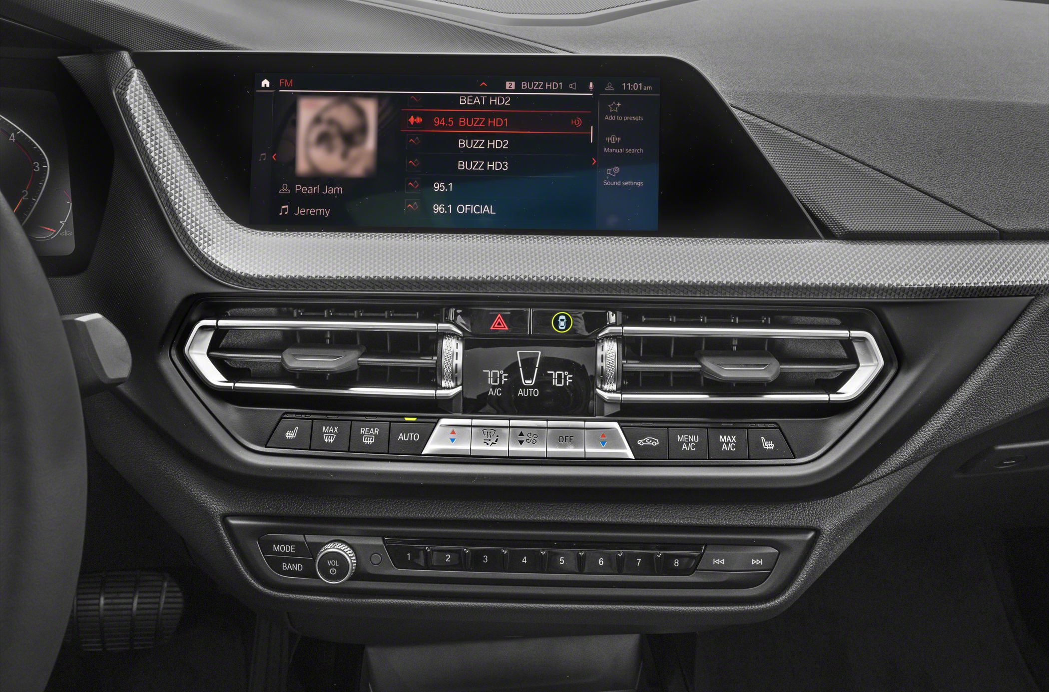 Car interior dashboard with climate control and infotainment screen