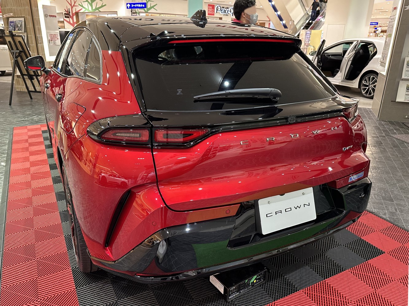 Rear hatchback design with sleek taillights and black contrast roof