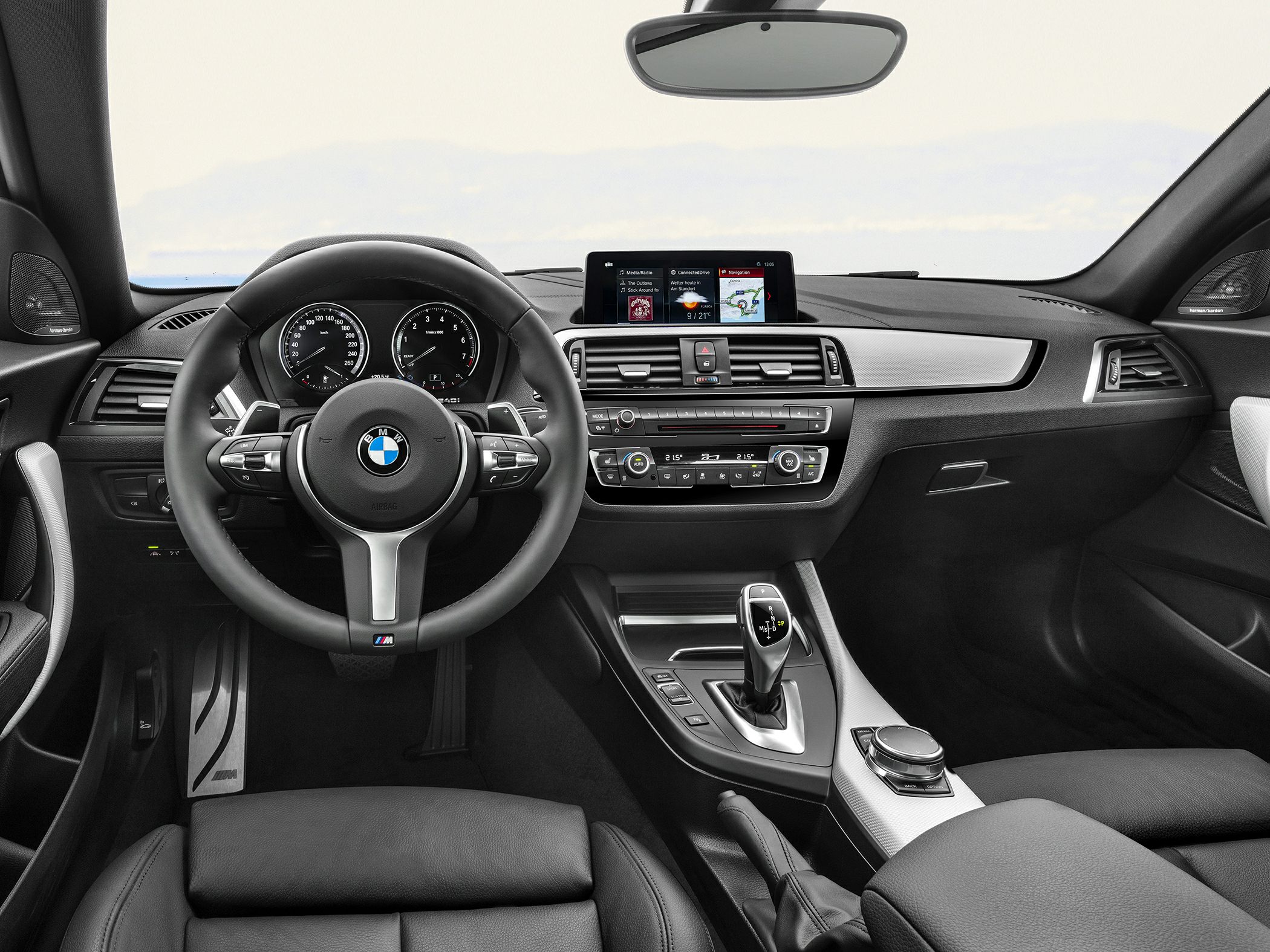 Interior dashboard and multifunction steering wheel with gear lever and infotainment screen