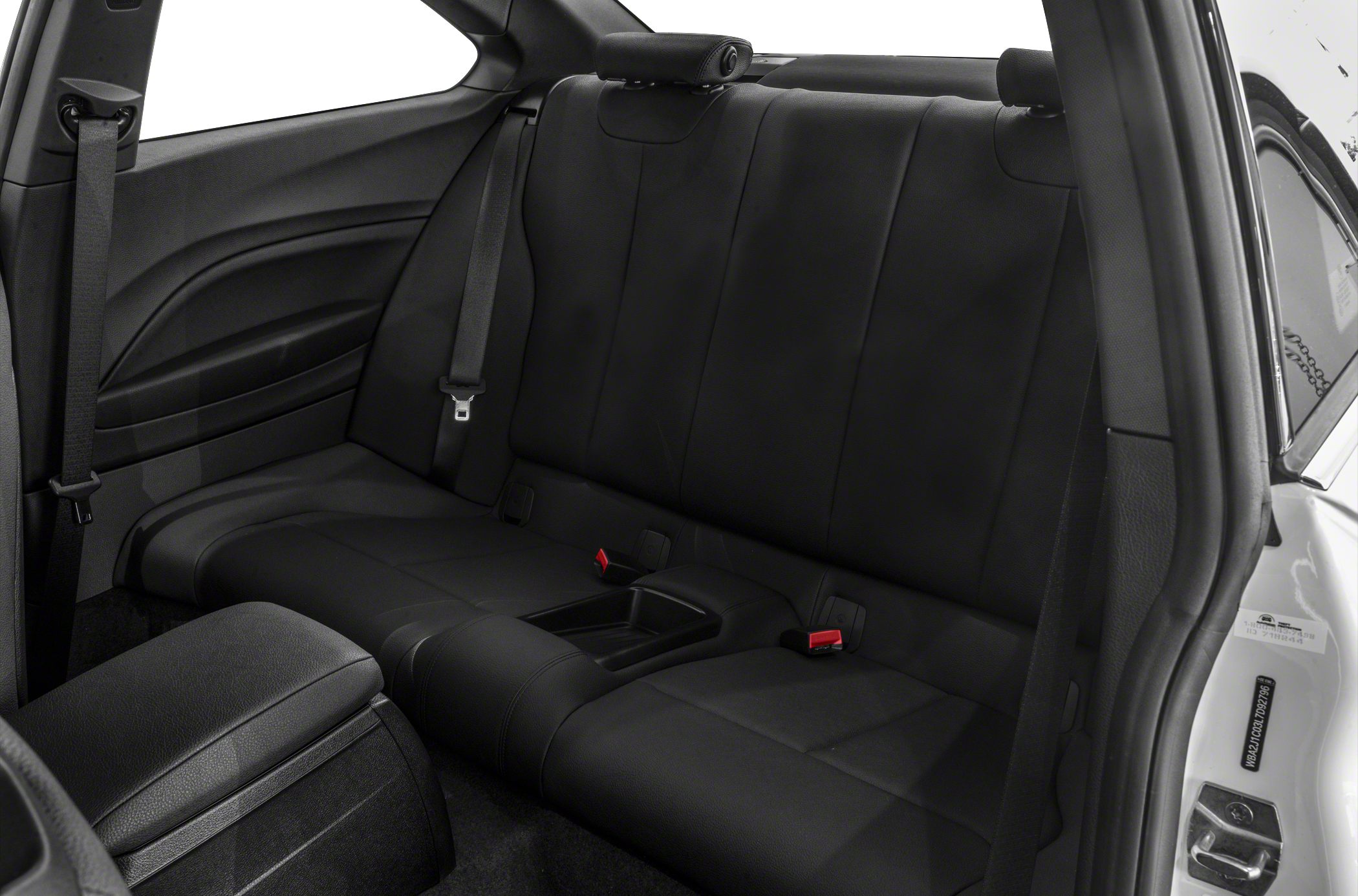 Black rear seats with integrated seatbelts and center armrest