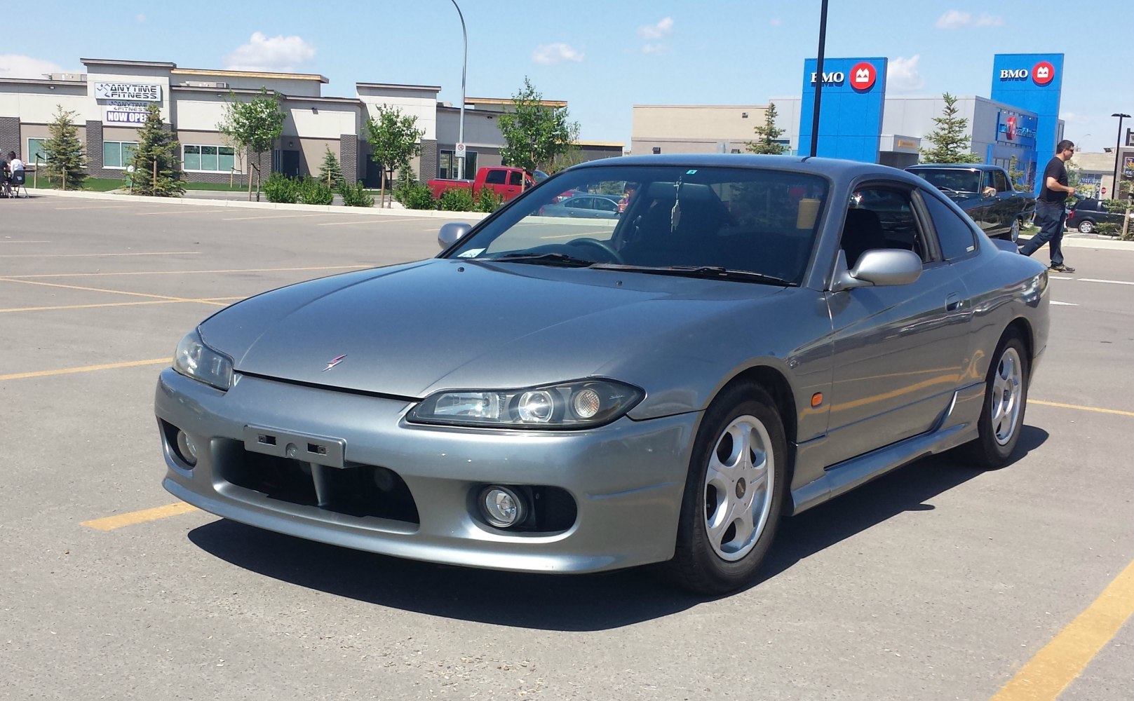 Front angled view with headlights and side skirts