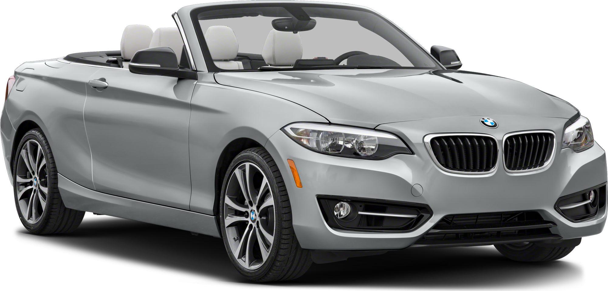 Front view of a convertible with grille, headlights, and alloy wheels.