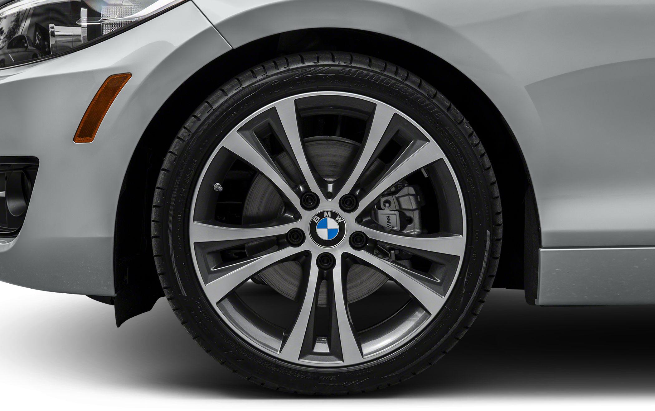 Close-up of alloy wheel and disc brake with caliper