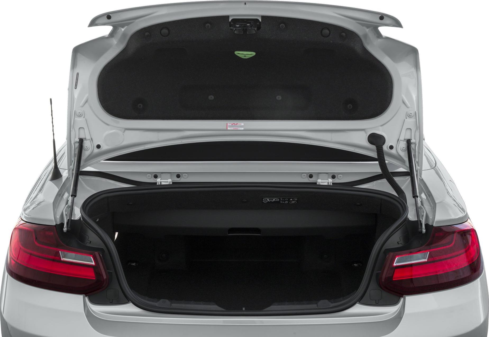 Open car trunk with visible tail lights and rear trunk interior