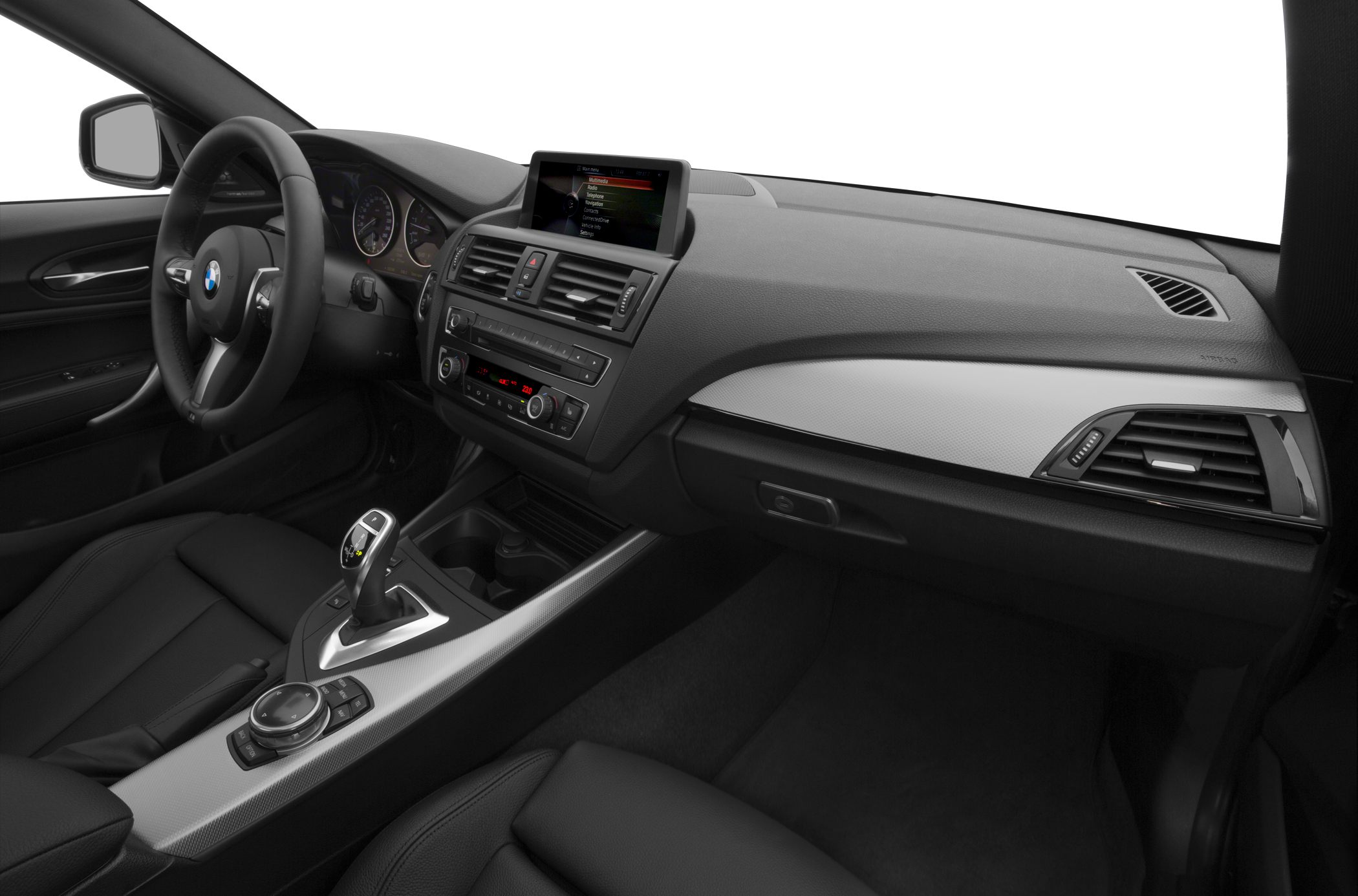 Dashboard, infotainment screen, center console with gear shifter and climate control