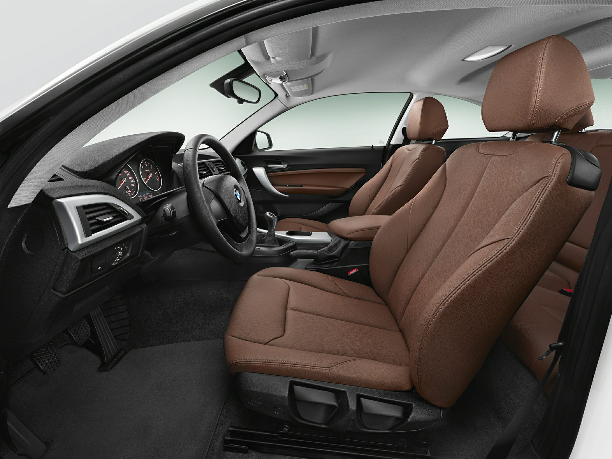 Brown leather seats and modern dashboard interior view