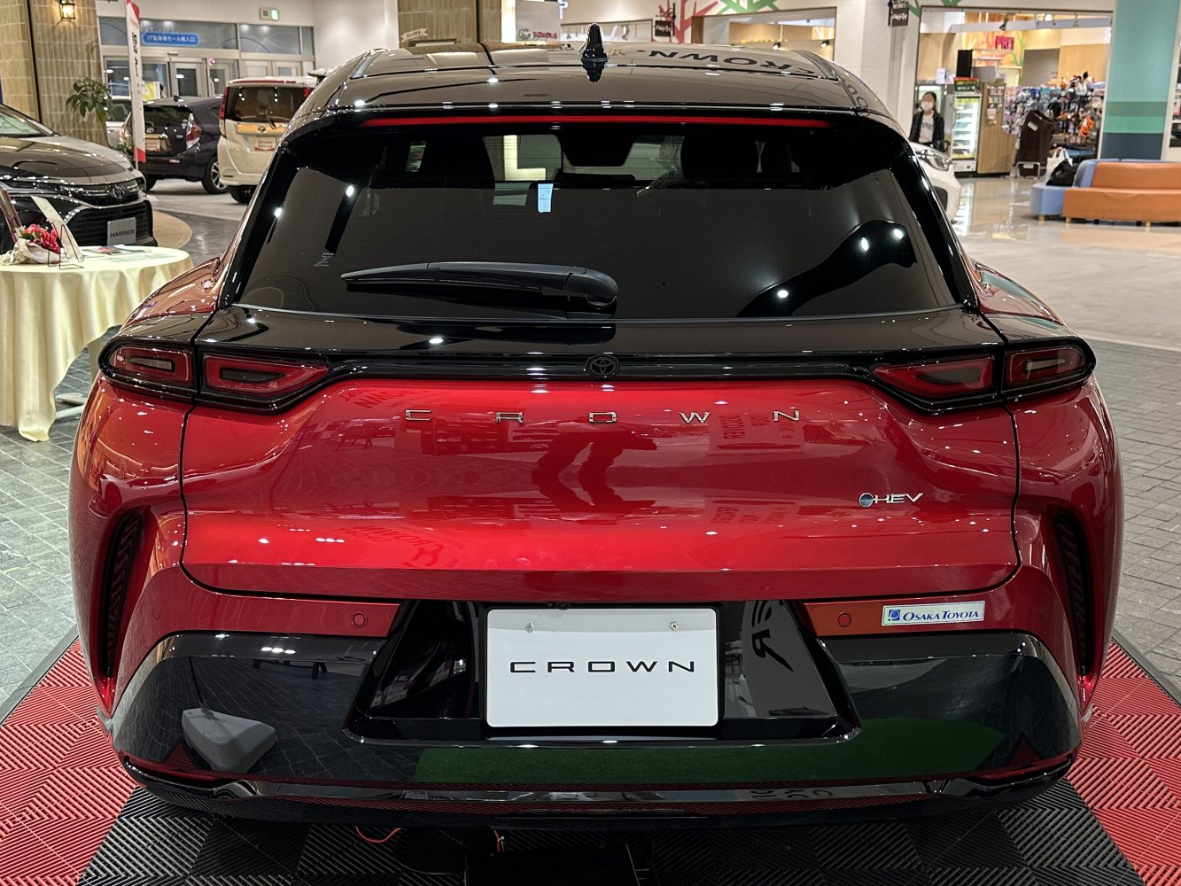 Rear view with hybrid badge and sleek taillights